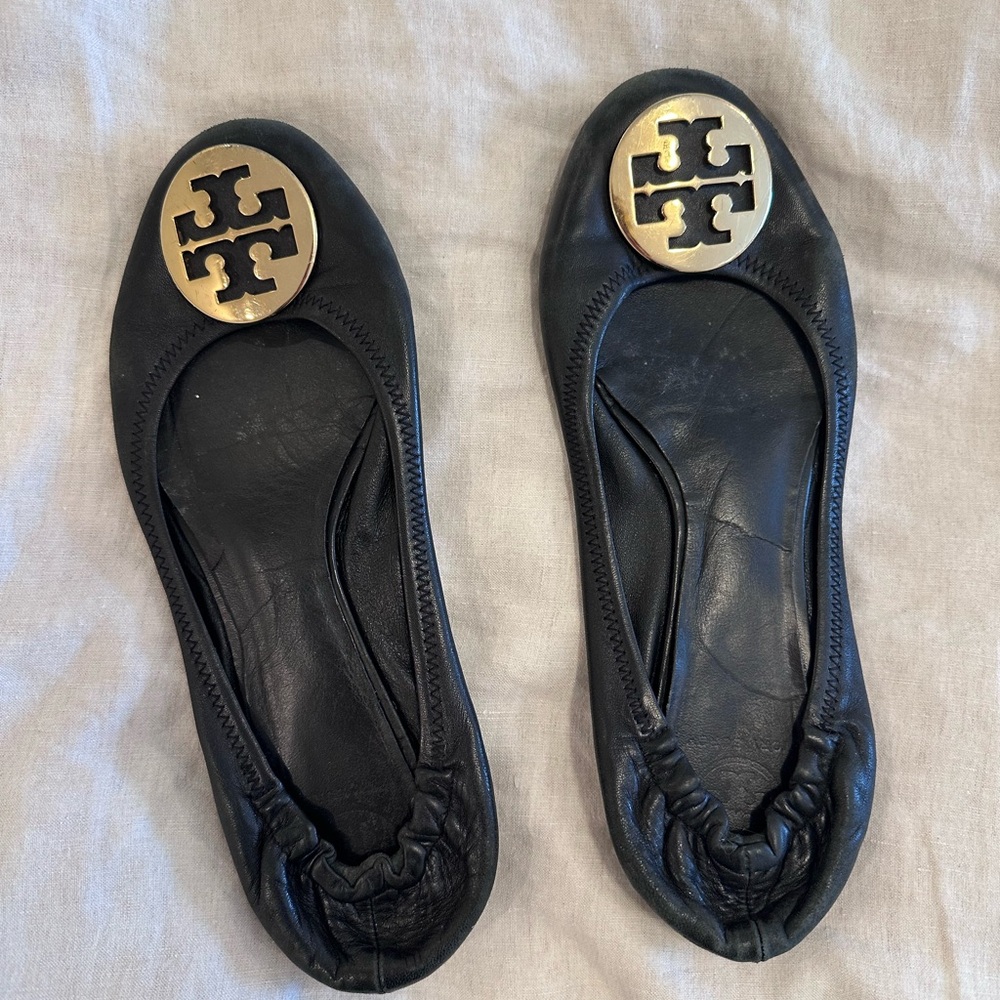 Tory Burch Black Flats with Gold Emblem